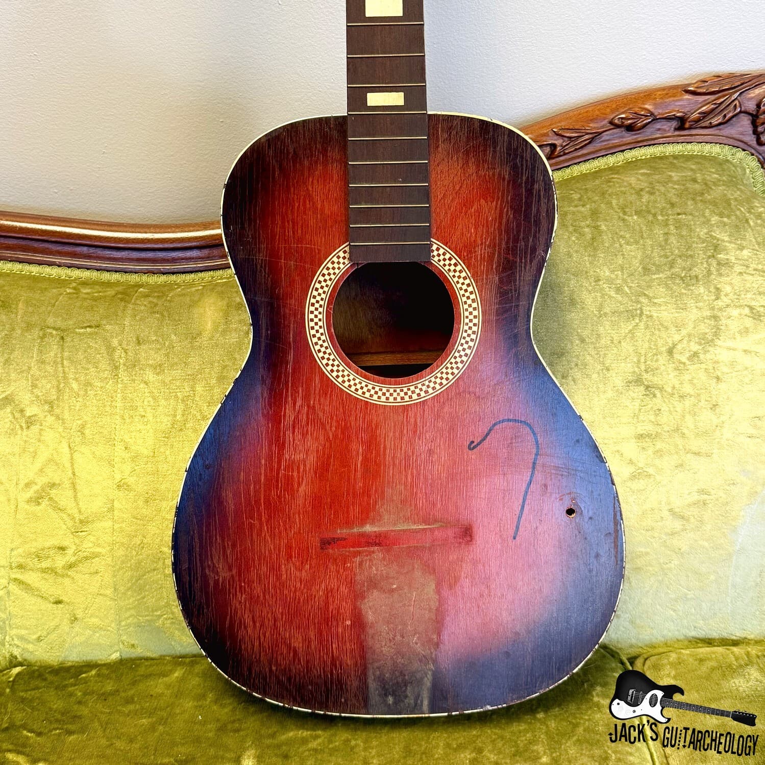 Sidewalk Sale: Silvertone Acoustic Parlor Guitar Husk (1960s - Redburst)
$125.00